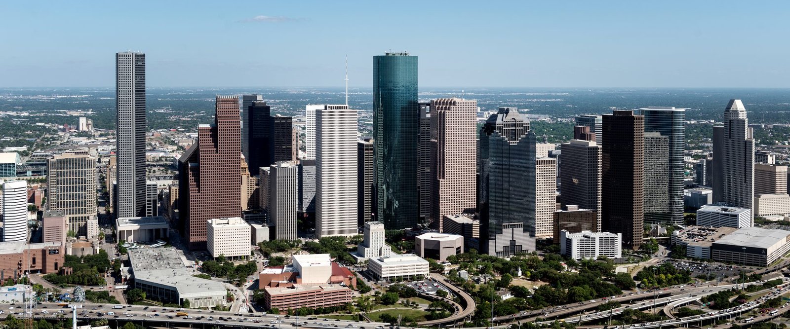 Aerial view of the downtown Houston skyline and surrounding freeways